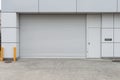 A closeup shot of automatic metal roller door used in factory, storage, garage, and industrial warehouse.