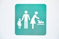 Closeup shot of a baby changing room sign icon on the wall Royalty Free Stock Photo