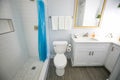 Closeup shot of a bathroom in white and blue colors Royalty Free Stock Photo