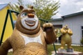 Closeup shot of a bear cartoon character sculpture at an amusement park in Kota Kinabalu