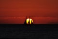 Closeup shot of beautiful boats sailing in the sea at sunset Royalty Free Stock Photo