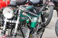 Closeup shot of a beautiful classic green Famel XF-17 motorcycle parked on display