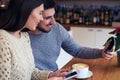 Couple making selfie and smiling while sitting at cafe Royalty Free Stock Photo