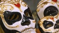 Closeup shot of beautiful Venetian carnival masks with golden and red elements Royalty Free Stock Photo