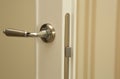 Closeup shot of beige partition door handle. Empty space Royalty Free Stock Photo