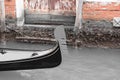 Closeup shot of a black gondola detail on a canal in Venice, Italy Royalty Free Stock Photo