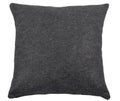 Closeup shot of a black pillow isolated on a white background Royalty Free Stock Photo