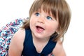 Closeup shot of blonde cute baby girl crawling