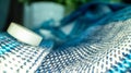 Closeup shot of a blue cloth with white buttons on it Royalty Free Stock Photo