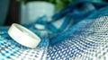 Closeup shot of a blue cloth with white buttons on it Royalty Free Stock Photo