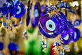 Closeup shot of blue evil eye ornaments at a market