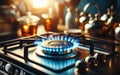 Closeup shot of blue fire from domestic kitchen stove top. Gas cooker with burning flames of propane gas. Industrial Royalty Free Stock Photo