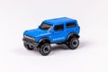 Closeup shot of a blue Hot Wheels Ford Bronco isolated on a white background