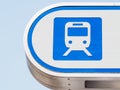 Closeup shot of a blue public train transportation symbol on a white background