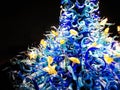 Closeup shot of blue and yellow curly glass sculpture in Seattle Museum, Washington, United States