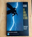 Closeup shot of the book The Dark Knight Returns by Frank Miller