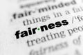 Closeup shot from the book of the word 'fairness' divided by syllables Royalty Free Stock Photo