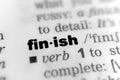 Closeup shot from the book of the word 'finish' divided by syllables Royalty Free Stock Photo