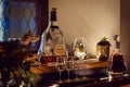 Closeup shot of a bottle of Hennessy cognac and glasses on the shelf Royalty Free Stock Photo