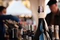 A closeup shot of bottles display at exhibitor stand at food and wine fair