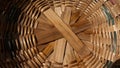 Closeup shot of the bottom of a woven wooden basket under the sunlight Royalty Free Stock Photo