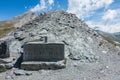Closeup shot of the boundary marker between France and Italy in Col Agnel mountain pass Royalty Free Stock Photo