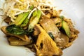 Closeup shot of a bowl of Thai delicious pad see ew with noodles, chicken, and vegetables Royalty Free Stock Photo