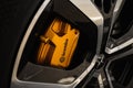 Closeup shot of Brembo golden brakes on a Polestar 2 Performance Pack Royalty Free Stock Photo