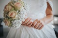 Closeup shot of the bride holding a bouquet of roses in Sarajevo, Bosnia and Herzegovina Royalty Free Stock Photo