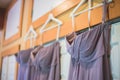 Closeup shot of bridesmaids dresses hanging up