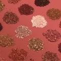 Closeup shot of broken multicolor eyeshadow as samples of cosmetic beauty product