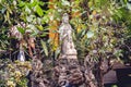 Closeup shot of Buddhist idols outside a temple in Vietnam