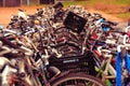 Closeup shot of bunch of bicycles parked in a main station of Amsterdam, Netherlands Royalty Free Stock Photo