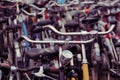 Closeup shot of bunch of bicycles parked in a main station of Amsterdam, Netherlands Royalty Free Stock Photo