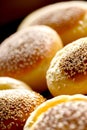 Closeup shot of a bunch- f bagels covered in sesame seeds