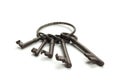 Closeup shot of a bunch of old rusty keys isolated on a white background Royalty Free Stock Photo