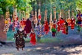 Closeup shot of a bunch of traditional puppets outdoors in Myanmar