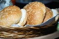 Closeup shot of burger bread buns in a basket Royalty Free Stock Photo