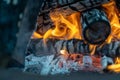 Closeup shot of a campfire and wood turning into ashes on an isolated background Royalty Free Stock Photo