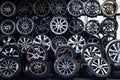 Closeup shot of car wheels and tires at workshop garage in Bangkok, Thailand
