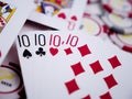 Closeup shot of 10 cards on poker chips Royalty Free Stock Photo