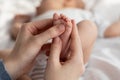 Closeup Shot Of Caring Mother Massaging Her Newborn Baby's Foot Royalty Free Stock Photo