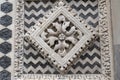 Closeup shot of a carving on white stone of the Santa Maria Della Spina church in the city of Pisa Royalty Free Stock Photo