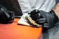 Closeup shot of a chef cutting the oyster Royalty Free Stock Photo