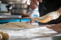 Closeup shot of a chef kneading dough in order to make Chapatti bread Royalty Free Stock Photo