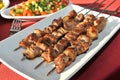Closeup shot of chicken barbeque on a white plate Royalty Free Stock Photo