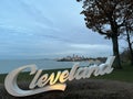 Closeup shot of the Cleveland sign with cityscape in the background