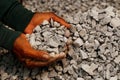 Closeup shot of coal miner in the man hands of the working. concept about coal mining for the generation of electricity worldwide,