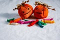 Closeup shot of colorful candies and decorative candy bags in shape of Halloween pumpkins Royalty Free Stock Photo