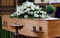 Closeup shot of a colorful casket in a hearse or chapel before funeral or burial at cemetery Royalty Free Stock Photo